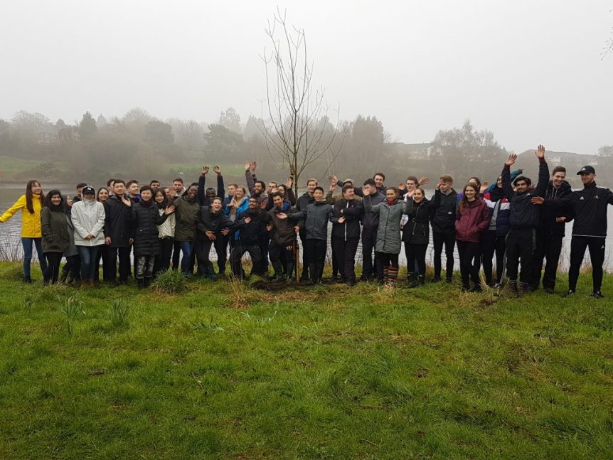 Volunteers planting trees at Witton Lakes